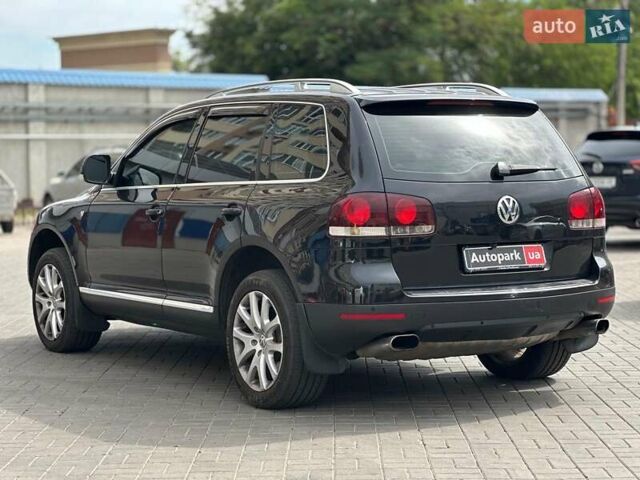 Черный Фольксваген Туарег, объемом двигателя 3 л и пробегом 261 тыс. км за 14440 $, фото 5 на Automoto.ua
