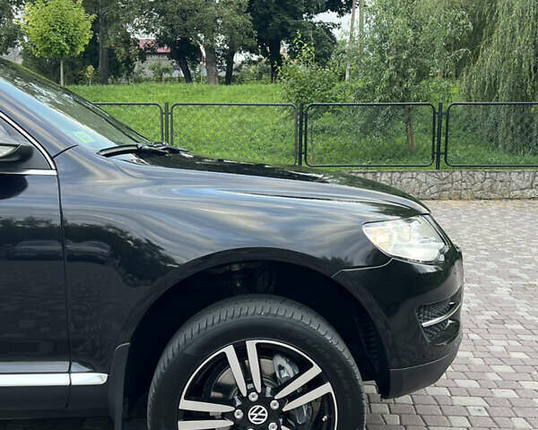 Черный Фольксваген Туарег, объемом двигателя 2.97 л и пробегом 235 тыс. км за 15200 $, фото 14 на Automoto.ua