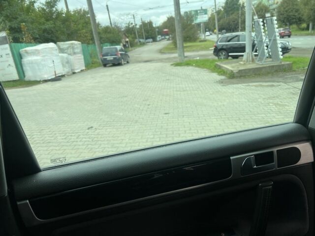 Чорний Фольксваген Туарег, об'ємом двигуна 3 л та пробігом 250 тис. км за 6999 $, фото 5 на Automoto.ua