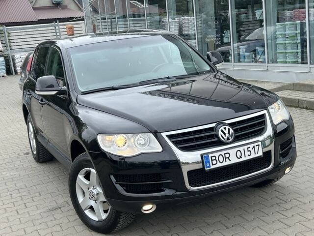 Чорний Фольксваген Туарег, об'ємом двигуна 3 л та пробігом 250 тис. км за 6999 $, фото 1 на Automoto.ua