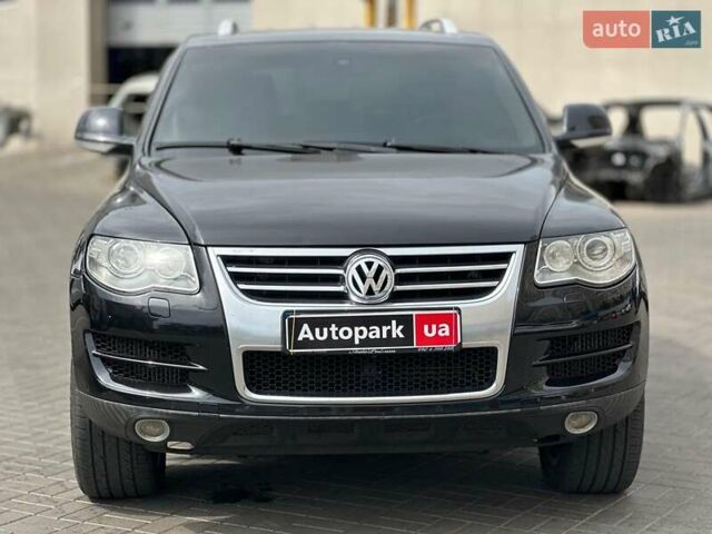 Черный Фольксваген Туарег, объемом двигателя 3 л и пробегом 261 тыс. км за 14440 $, фото 1 на Automoto.ua