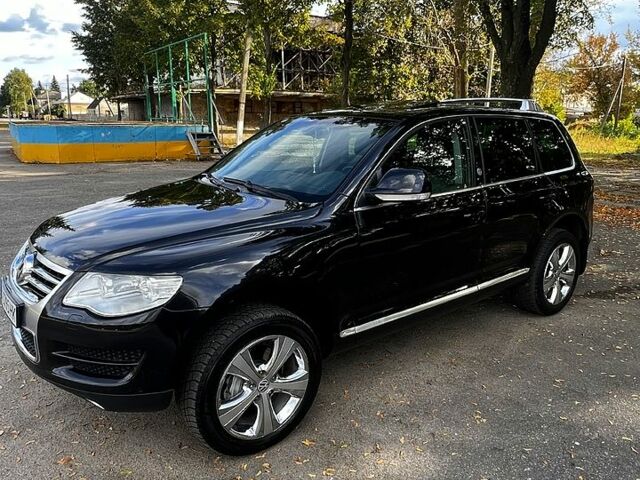 Черный Фольксваген Туарег, объемом двигателя 3 л и пробегом 325 тыс. км за 13000 $, фото 4 на Automoto.ua