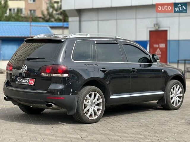 Черный Фольксваген Туарег, объемом двигателя 3 л и пробегом 261 тыс. км за 14440 $, фото 3 на Automoto.ua