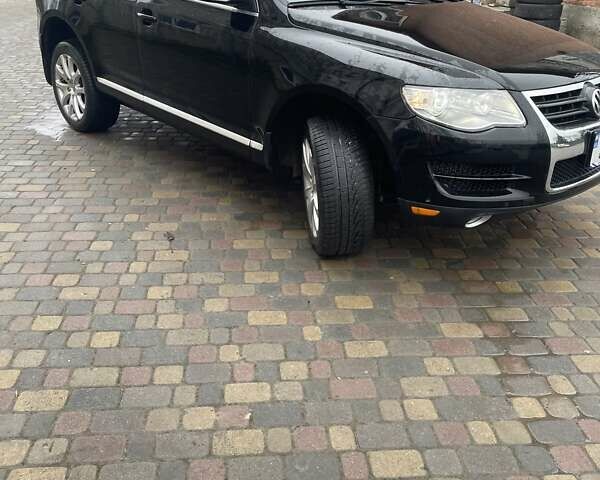 Черный Фольксваген Туарег, объемом двигателя 2.97 л и пробегом 348 тыс. км за 12500 $, фото 3 на Automoto.ua