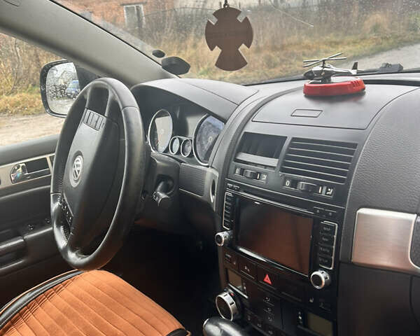 Черный Фольксваген Туарег, объемом двигателя 2.97 л и пробегом 308 тыс. км за 12500 $, фото 12 на Automoto.ua