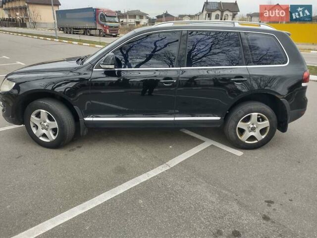 Черный Фольксваген Туарег, объемом двигателя 2.5 л и пробегом 294 тыс. км за 10800 $, фото 1 на Automoto.ua