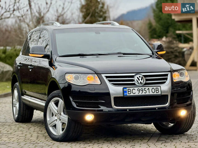 Черный Фольксваген Туарег, объемом двигателя 3 л и пробегом 280 тыс. км за 11700 $, фото 1 на Automoto.ua