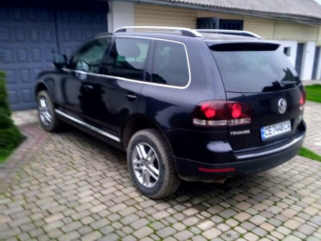 Черный Фольксваген Туарег, объемом двигателя 3 л и пробегом 262 тыс. км за 10500 $, фото 1 на Automoto.ua