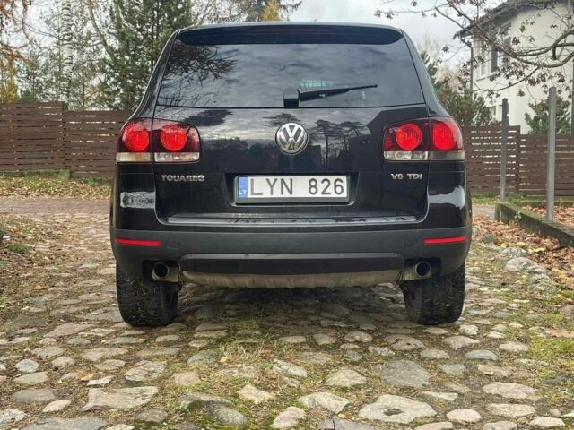 Черный Фольксваген Туарег, объемом двигателя 3 л и пробегом 379 тыс. км за 6630 $, фото 1 на Automoto.ua
