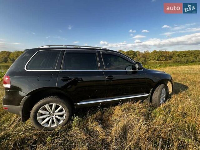 Чорний Фольксваген Туарег, об'ємом двигуна 2.97 л та пробігом 284 тис. км за 12000 $, фото 4 на Automoto.ua