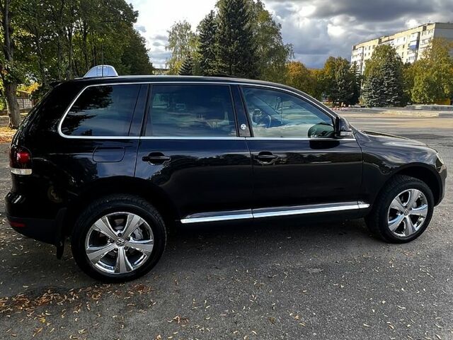 Черный Фольксваген Туарег, объемом двигателя 3 л и пробегом 325 тыс. км за 13000 $, фото 5 на Automoto.ua