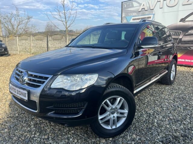 Черный Фольксваген Туарег, объемом двигателя 3 л и пробегом 264 тыс. км за 11799 $, фото 1 на Automoto.ua