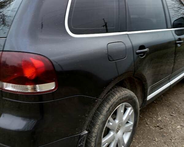 Черный Фольксваген Туарег, объемом двигателя 3.6 л и пробегом 148 тыс. км за 14000 $, фото 2 на Automoto.ua