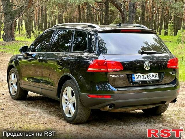 Черный Фольксваген Туарег, объемом двигателя 3 л и пробегом 215 тыс. км за 17900 $, фото 1 на Automoto.ua