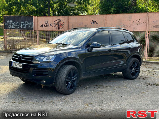Черный Фольксваген Туарег, объемом двигателя 3 л и пробегом 260 тыс. км за 16500 $, фото 1 на Automoto.ua