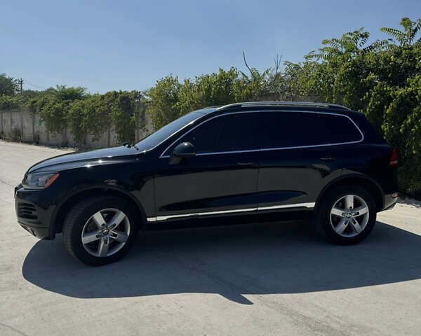 Черный Фольксваген Туарег, объемом двигателя 3 л и пробегом 170 тыс. км за 14999 $, фото 3 на Automoto.ua