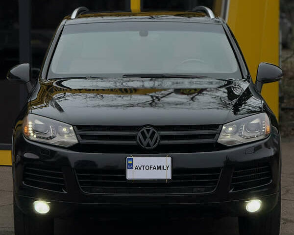 Черный Фольксваген Туарег, объемом двигателя 2.97 л и пробегом 301 тыс. км за 15300 $, фото 1 на Automoto.ua