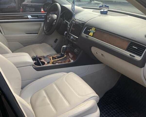 Черный Фольксваген Туарег, объемом двигателя 2.97 л и пробегом 320 тыс. км за 16900 $, фото 2 на Automoto.ua