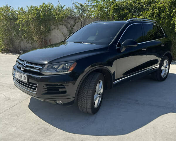 Черный Фольксваген Туарег, объемом двигателя 3 л и пробегом 170 тыс. км за 14999 $, фото 2 на Automoto.ua