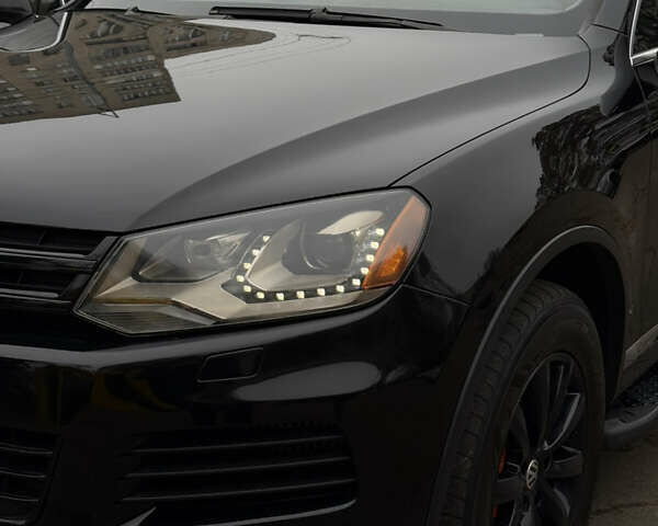 Черный Фольксваген Туарег, объемом двигателя 2.97 л и пробегом 301 тыс. км за 15300 $, фото 34 на Automoto.ua