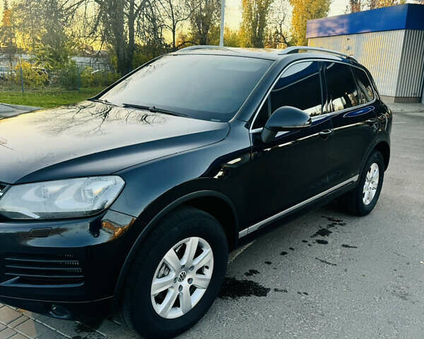 Черный Фольксваген Туарег, объемом двигателя 2.97 л и пробегом 400 тыс. км за 16000 $, фото 3 на Automoto.ua