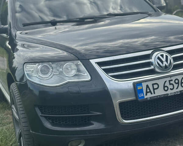 Черный Фольксваген Туарег, объемом двигателя 3 л и пробегом 255 тыс. км за 14500 $, фото 2 на Automoto.ua