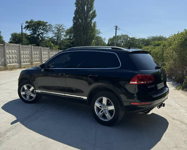 Черный Фольксваген Туарег, объемом двигателя 3 л и пробегом 170 тыс. км за 14999 $, фото 4 на Automoto.ua