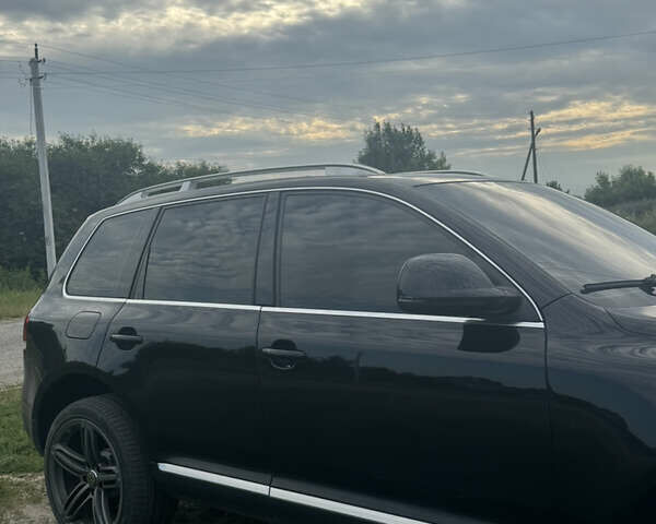 Черный Фольксваген Туарег, объемом двигателя 3 л и пробегом 255 тыс. км за 14500 $, фото 3 на Automoto.ua