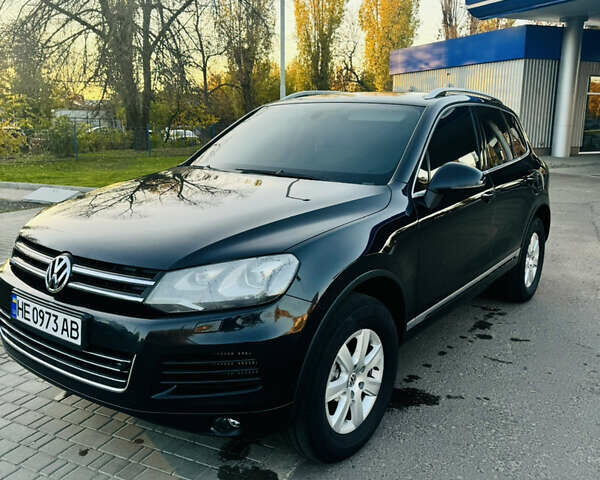Черный Фольксваген Туарег, объемом двигателя 2.97 л и пробегом 400 тыс. км за 16000 $, фото 2 на Automoto.ua
