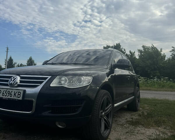 Черный Фольксваген Туарег, объемом двигателя 3 л и пробегом 255 тыс. км за 14500 $, фото 4 на Automoto.ua