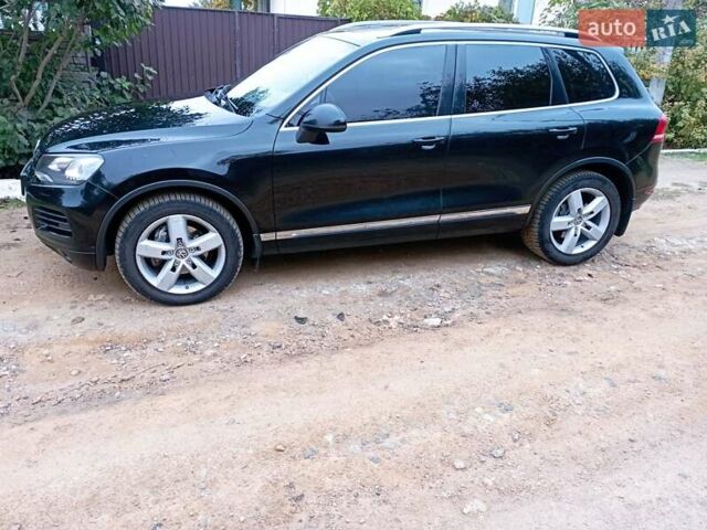 Черный Фольксваген Туарег, объемом двигателя 3 л и пробегом 338 тыс. км за 16200 $, фото 6 на Automoto.ua