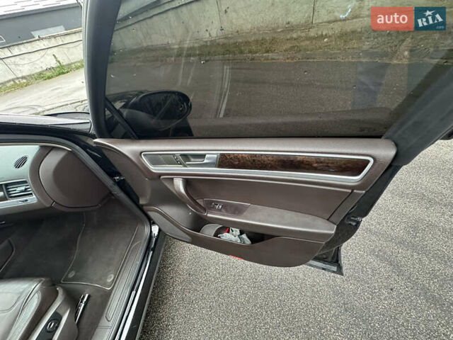 Чорний Фольксваген Туарег, об'ємом двигуна 3 л та пробігом 130 тис. км за 16900 $, фото 45 на Automoto.ua