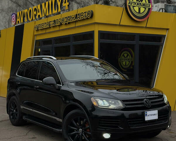 Черный Фольксваген Туарег, объемом двигателя 2.97 л и пробегом 301 тыс. км за 15300 $, фото 2 на Automoto.ua