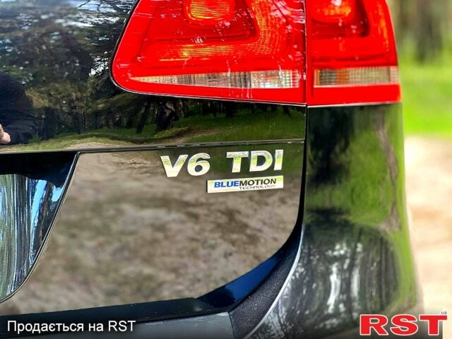 Черный Фольксваген Туарег, объемом двигателя 3 л и пробегом 215 тыс. км за 17900 $, фото 2 на Automoto.ua