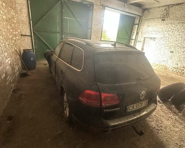 Фольксваген Туарег 2010 в Белой Церкве на Automoto.ua Черный Фольксваген Туарег, объемом двигателя 4.13 л и пробегом 300 тыс. км за 6500 $, фото 1 на Automoto.ua