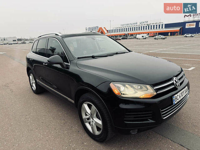 Черный Фольксваген Туарег, объемом двигателя 3 л и пробегом 280 тыс. км за 14500 $, фото 1 на Automoto.ua