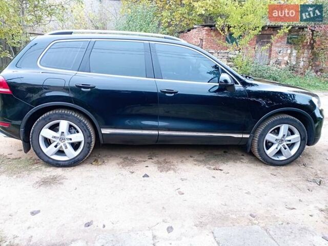 Черный Фольксваген Туарег, объемом двигателя 3 л и пробегом 338 тыс. км за 16200 $, фото 4 на Automoto.ua