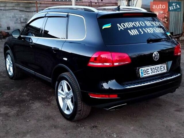 Чорний Фольксваген Туарег, об'ємом двигуна 3 л та пробігом 267 тис. км за 24000 $, фото 1 на Automoto.ua