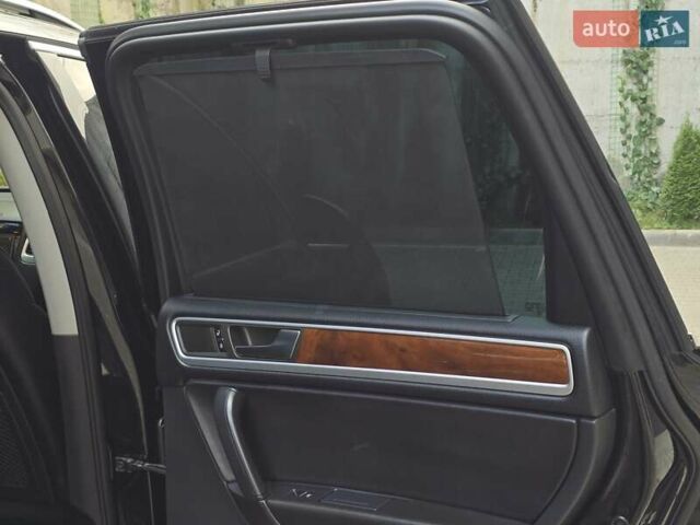 Чорний Фольксваген Туарег, об'ємом двигуна 3 л та пробігом 180 тис. км за 15499 $, фото 47 на Automoto.ua