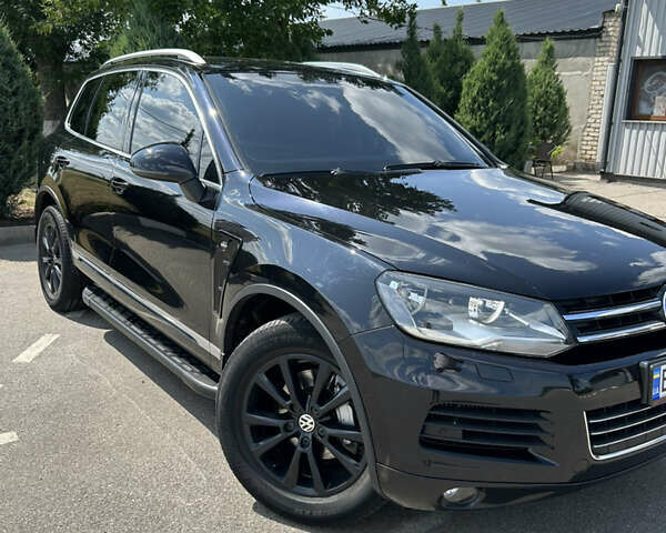 Черный Фольксваген Туарег, объемом двигателя 3 л и пробегом 294 тыс. км за 18500 $, фото 3 на Automoto.ua