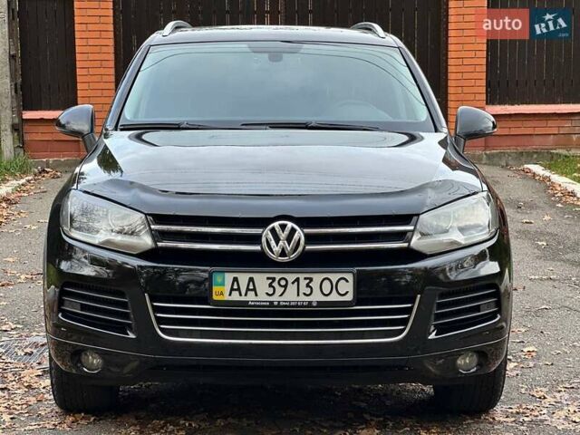 Чорний Фольксваген Туарег, об'ємом двигуна 3 л та пробігом 210 тис. км за 16500 $, фото 5 на Automoto.ua