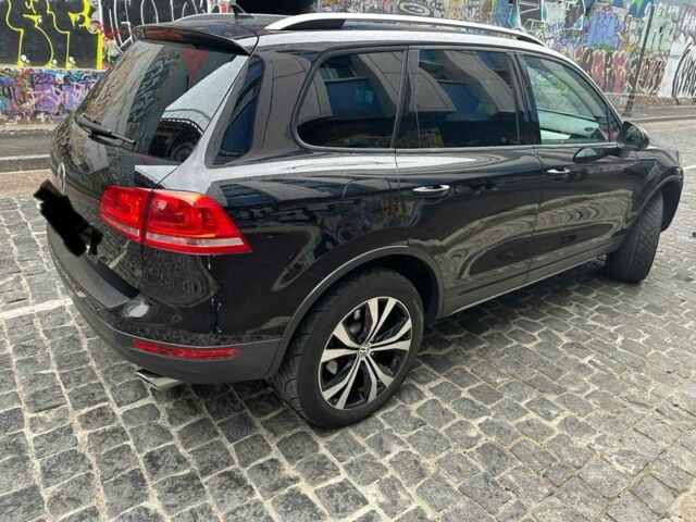 Черный Фольксваген Туарег, объемом двигателя 3 л и пробегом 310 тыс. км за 19500 $, фото 2 на Automoto.ua