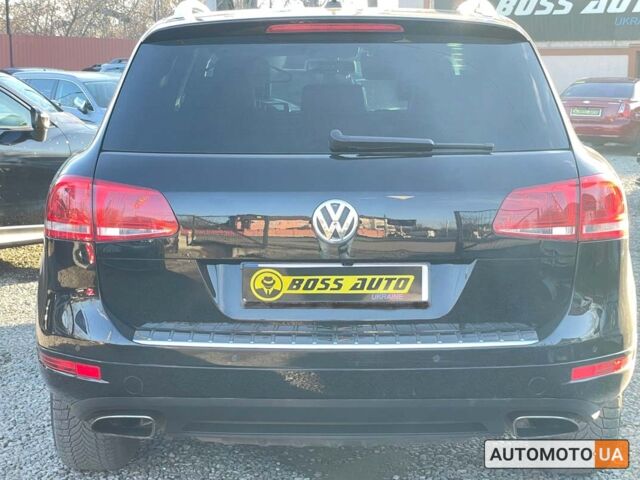 Черный Фольксваген Туарег, объемом двигателя 3 л и пробегом 235 тыс. км за 19999 $, фото 4 на Automoto.ua