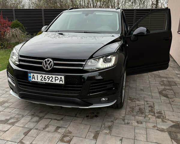 Черный Фольксваген Туарег, объемом двигателя 2.97 л и пробегом 236 тыс. км за 16700 $, фото 3 на Automoto.ua