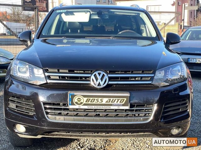 Черный Фольксваген Туарег, объемом двигателя 3 л и пробегом 235 тыс. км за 19999 $, фото 1 на Automoto.ua