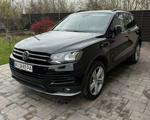 Черный Фольксваген Туарег, объемом двигателя 2.97 л и пробегом 236 тыс. км за 16700 $, фото 1 на Automoto.ua