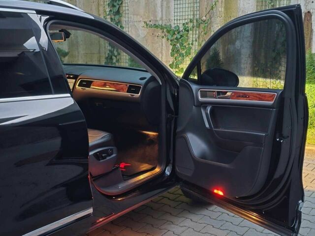 Чорний Фольксваген Туарег, об'ємом двигуна 3 л та пробігом 180 тис. км за 14499 $, фото 18 на Automoto.ua