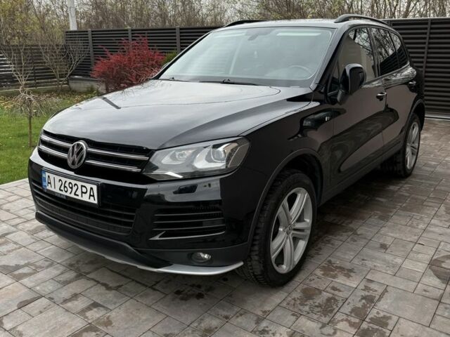 Черный Фольксваген Туарег, объемом двигателя 3 л и пробегом 235 тыс. км за 16700 $, фото 1 на Automoto.ua