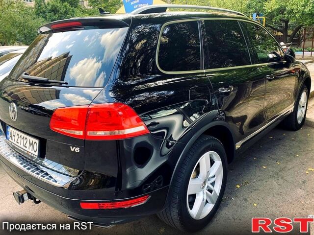 Чорний Фольксваген Туарег, об'ємом двигуна 3.6 л та пробігом 225 тис. км за 16900 $, фото 1 на Automoto.ua