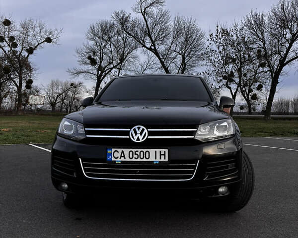 Чорний Фольксваген Туарег, об'ємом двигуна 2.97 л та пробігом 318 тис. км за 18500 $, фото 1 на Automoto.ua